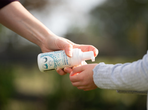 Alcohol-free hand sanitiser foam for children being used